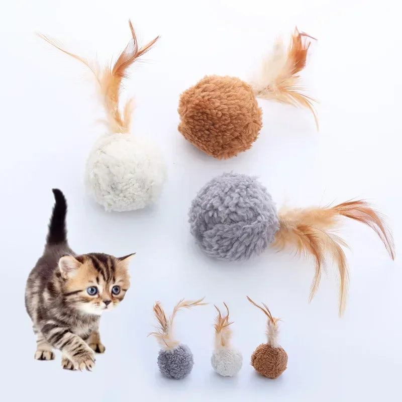 Cat toy plush ball with feathers
