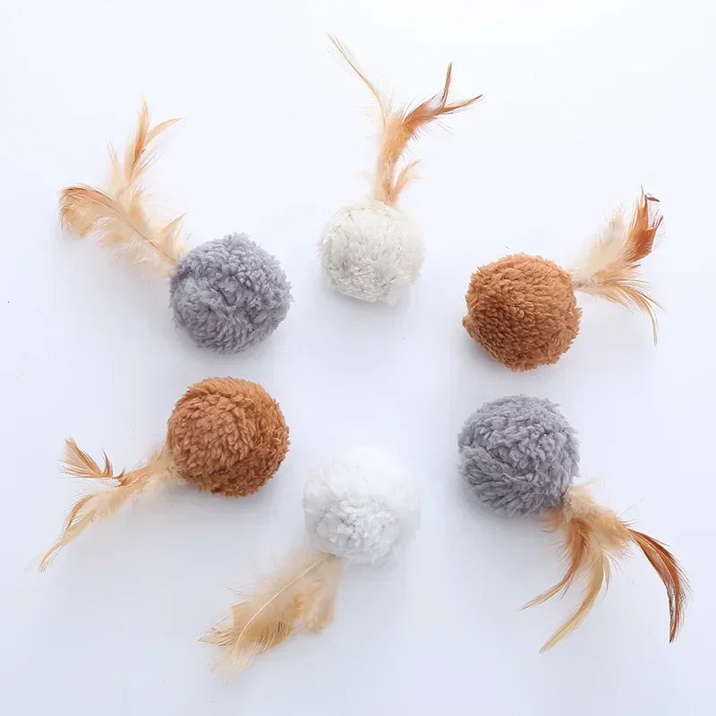 Cat toy plush ball with feathers